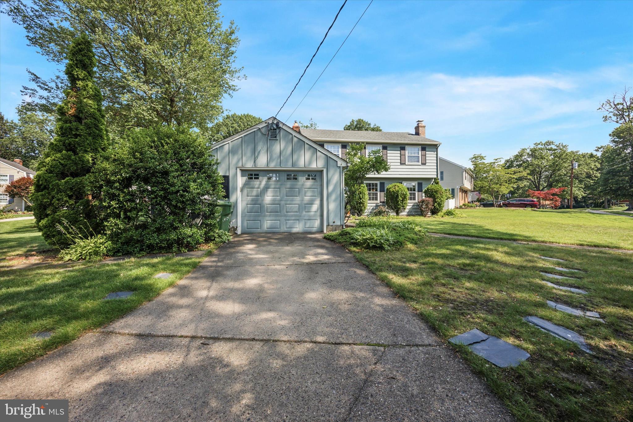 111 Wayside Drive Cherry Hill, NJ 08034 - Photo 2 of 28 a front view of a house with a yard