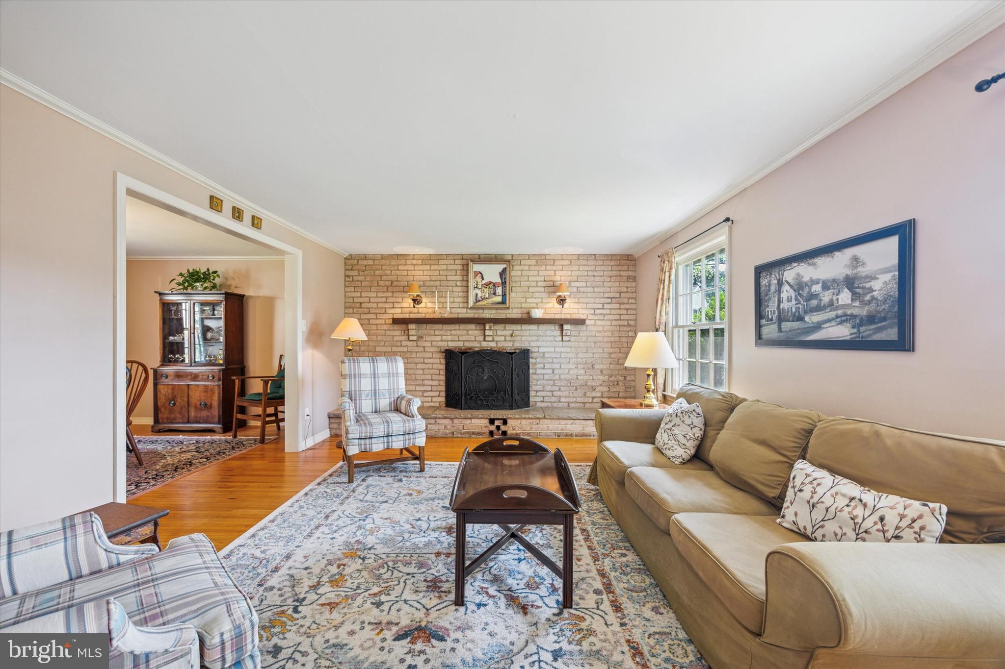 111 Wayside Drive Cherry Hill, NJ 08034 - Photo 5 of 28 a living room with furniture flat screen tv and a fireplace