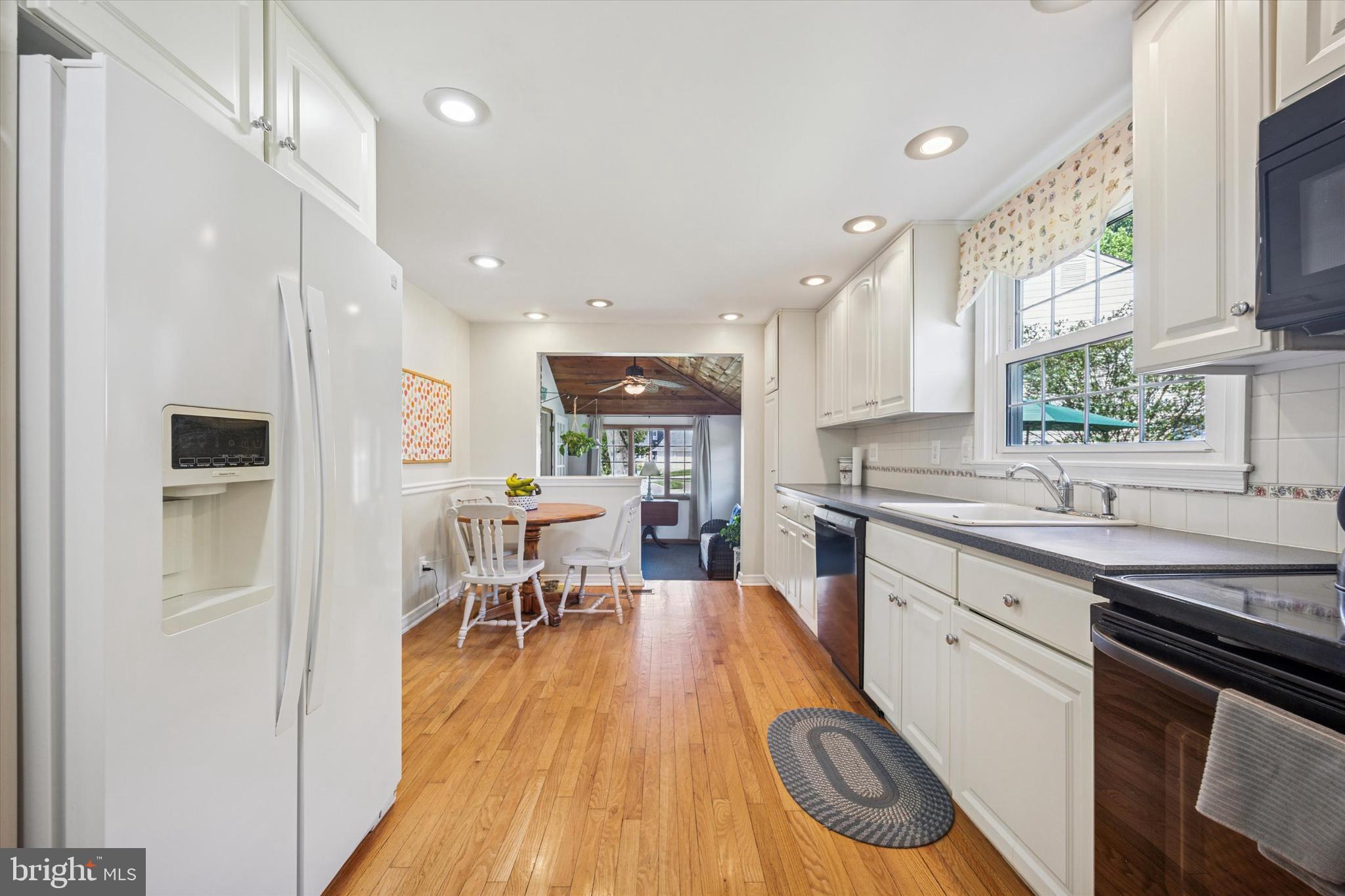 111 Wayside Drive Cherry Hill, NJ 08034 - Photo 8 of 28 a kitchen with a sink appliances and cabinets