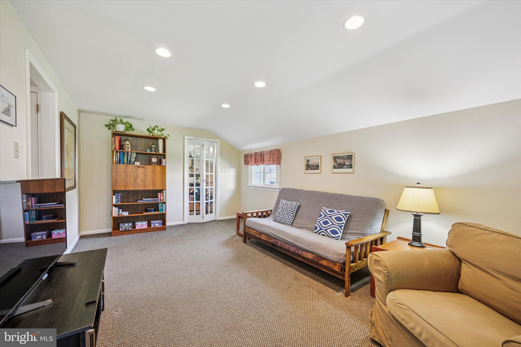 111 Wayside Drive Cherry Hill, NJ 08034 - Photo 10 of 28 a living room with furniture and a flat screen tv