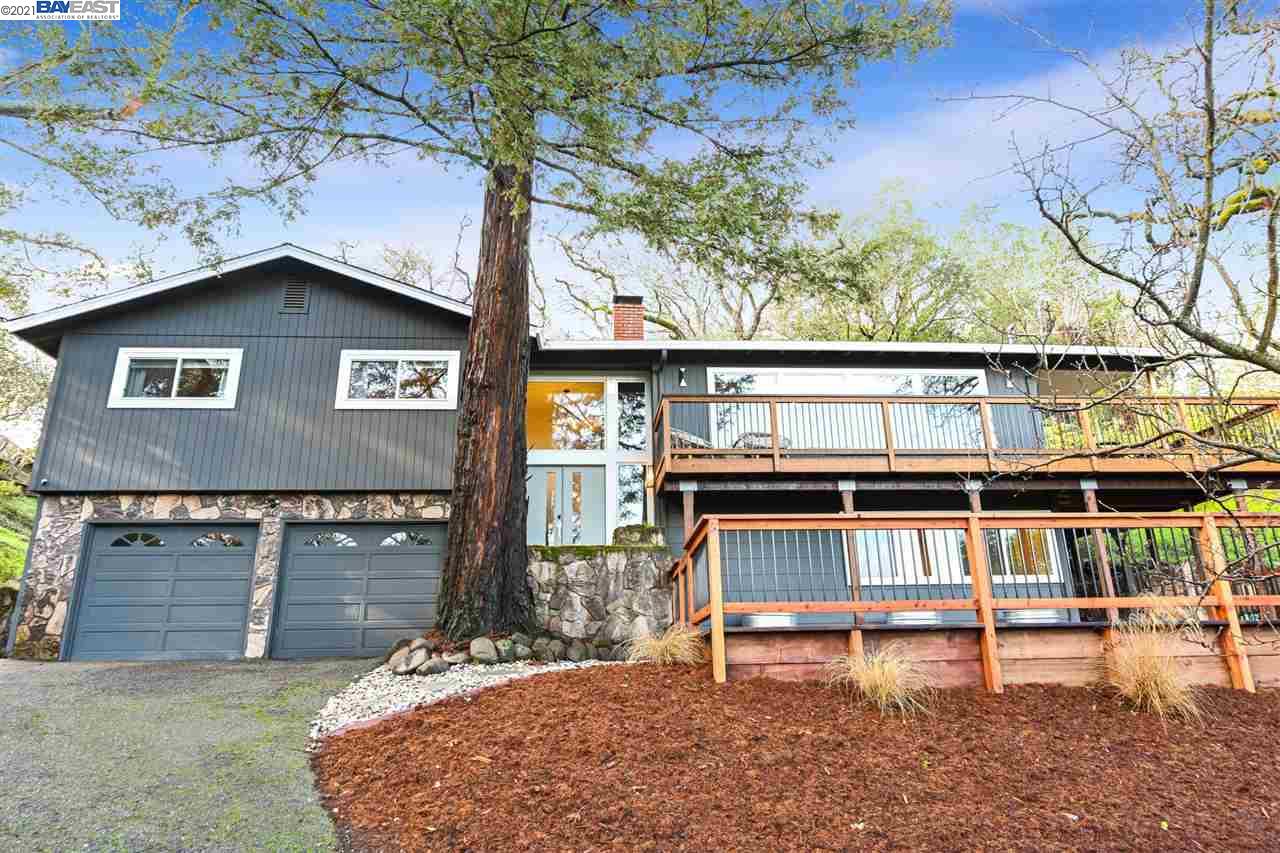 a view of house with outdoor space