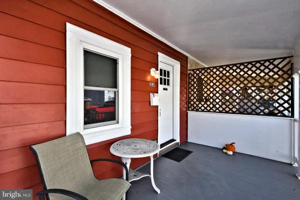 a outdoor seating area with furniture