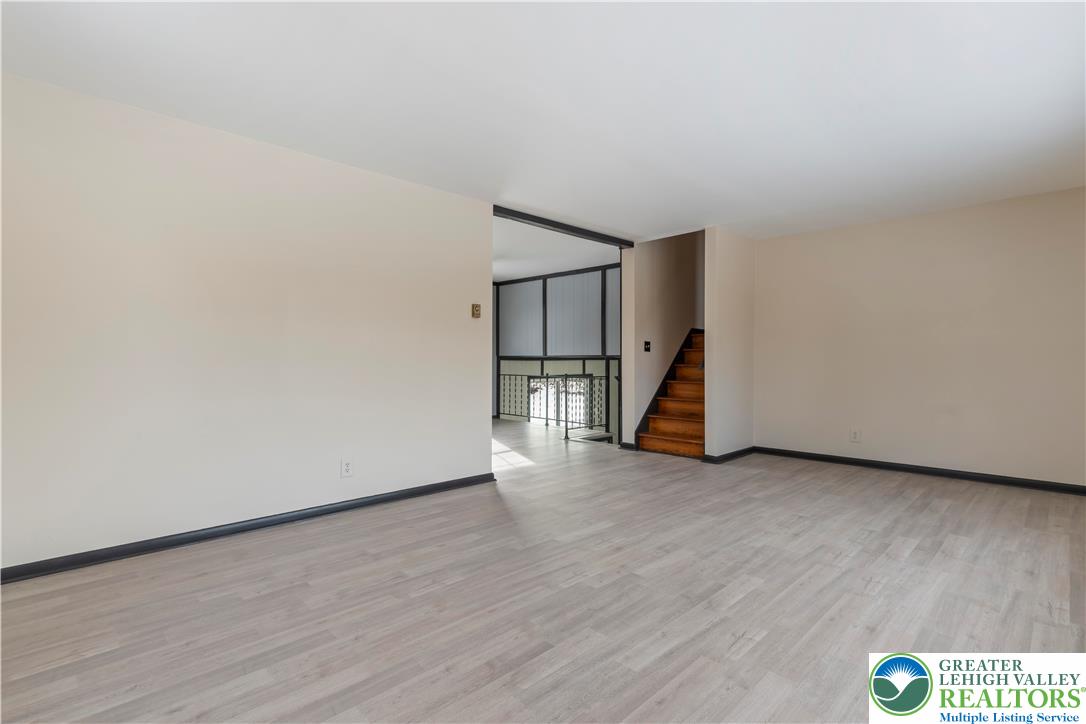 438 Nursery Road Kempton, PA 19529 - Photo 16 of 38 a view of empty room with wooden floor