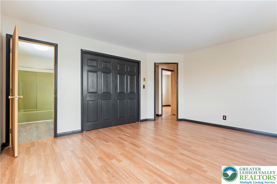 438 Nursery Road Kempton, PA 19529 - Photo 19 of 38 a view of an empty room with wooden floor