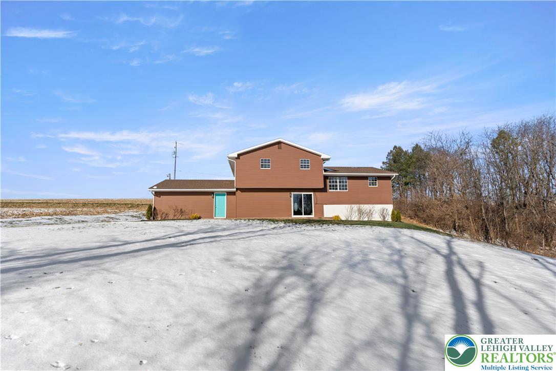 438 Nursery Road Kempton, PA 19529 - Photo 34 of 38 a big house with a big yard and large trees