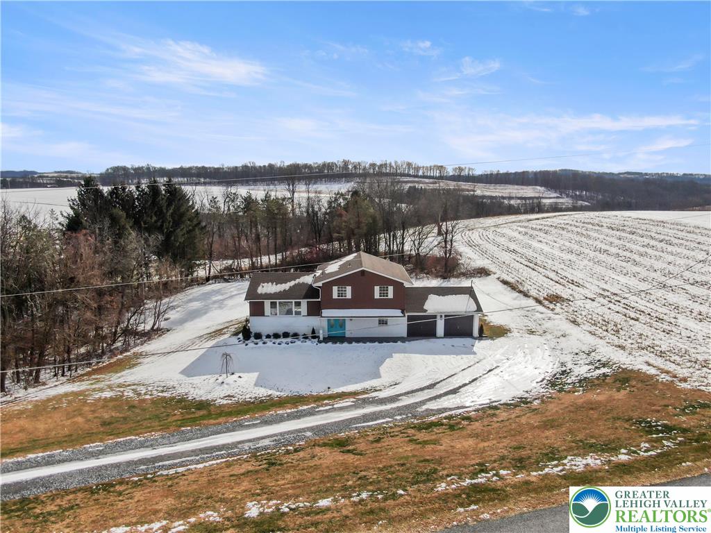 438 Nursery Road Kempton, PA 19529 - Photo 38 of 38 a view of a lake with a mountain in the background
