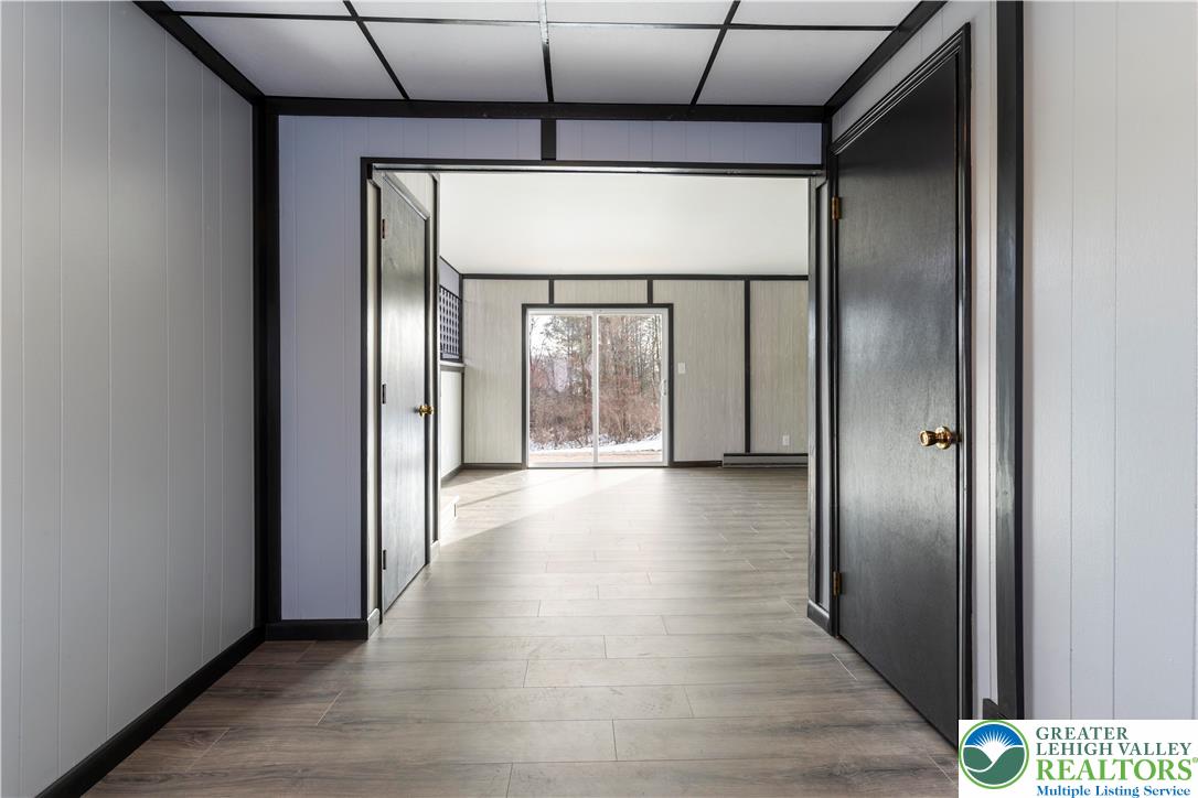 438 Nursery Road Kempton, PA 19529 - Photo 5 of 38 a view of hallway with wooden floor