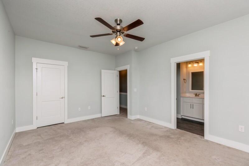 151 North Sand Palm Road, Unit 151 Freeport, FL 32439 - Photo 13 of 35 a view of an empty room with a ceiling fan