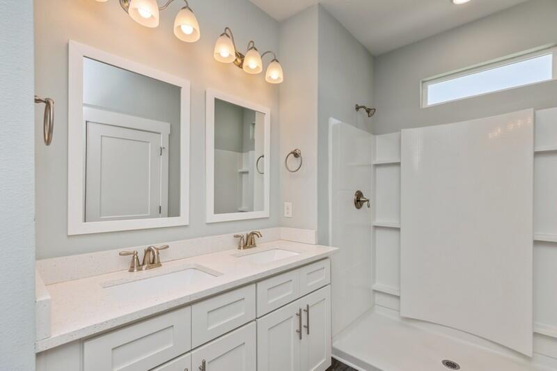 151 North Sand Palm Road, Unit 151 Freeport, FL 32439 - Photo 15 of 35 a bathroom with a sink a toilet and shower