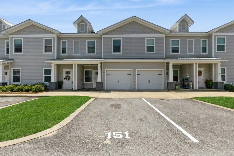 151 North Sand Palm Road, Unit 151 Freeport, FL 32439 - Photo 2 of 35 a front view of a house with a yard
