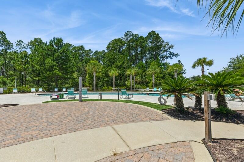 151 North Sand Palm Road, Unit 151 Freeport, FL 32439 - Photo 32 of 35 a view of a street with a house in the background