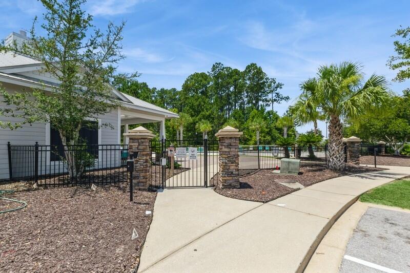 151 North Sand Palm Road, Unit 151 Freeport, FL 32439 - Photo 33 of 35 a view of a backyard with a patio