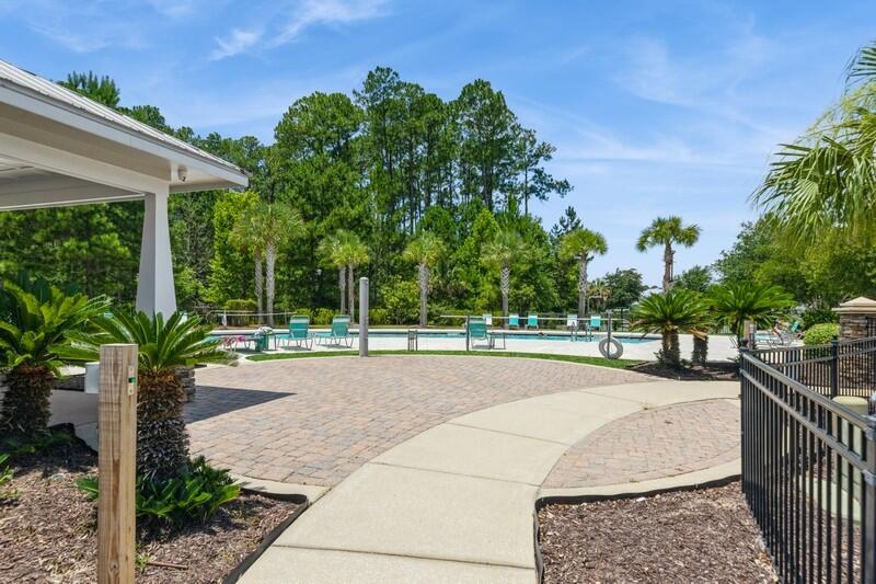 151 North Sand Palm Road, Unit 151 Freeport, FL 32439 - Photo 34 of 35 a house view with a garden space