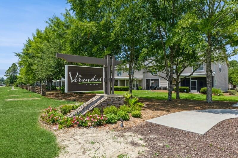 151 North Sand Palm Road, Unit 151 Freeport, FL 32439 - Photo 35 of 35 a sign on the side of a building