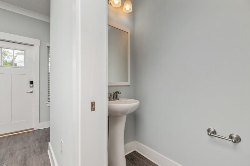 151 North Sand Palm Road, Unit 151 Freeport, FL 32439 - Photo 4 of 35 a bathroom with a sink and a mirror