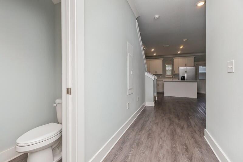 151 North Sand Palm Road, Unit 151 Freeport, FL 32439 - Photo 5 of 35 a view of a kitchen from the hallway