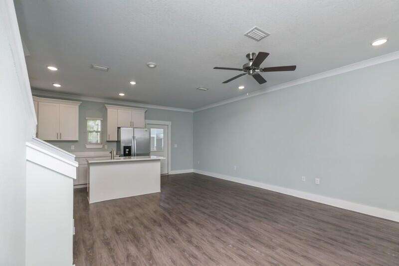 151 North Sand Palm Road, Unit 151 Freeport, FL 32439 - Photo 6 of 35 a view of kitchen with sink microwave and stove