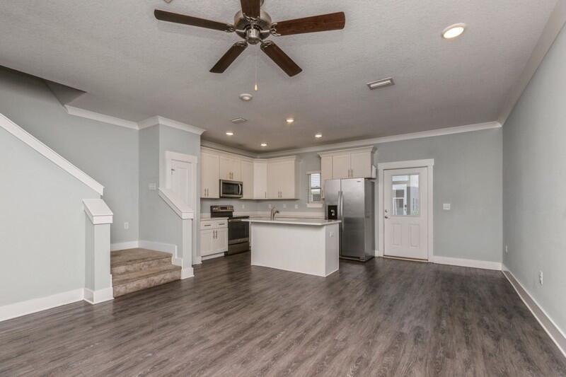 151 North Sand Palm Road, Unit 151 Freeport, FL 32439 - Photo 8 of 35 a view of kitchen with sink microwave and stove