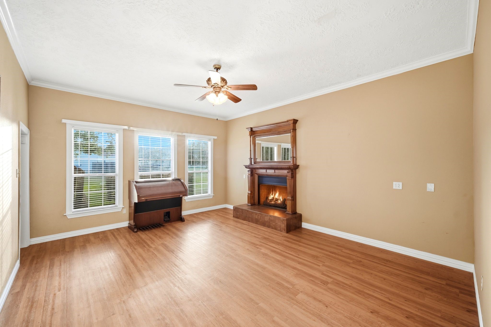144 Wood Farm Road Huntsville, TX 77320 - Photo 8 of 50 a view of livingroom with furniture a fireplace and wooden floor