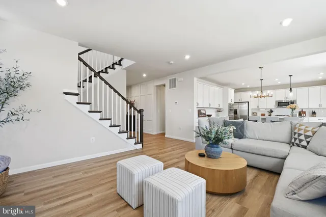 a view of a dining room with furniture and window