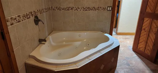 a bathroom with a bathtub