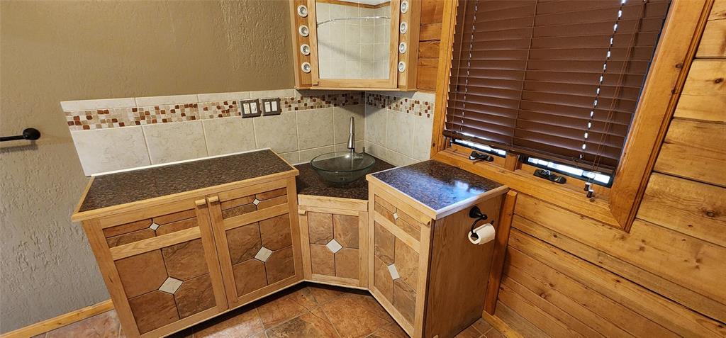 1992 County Road 330 Ranger, TX 76470 - Photo 15 of 40 a utility room with dryer and washer