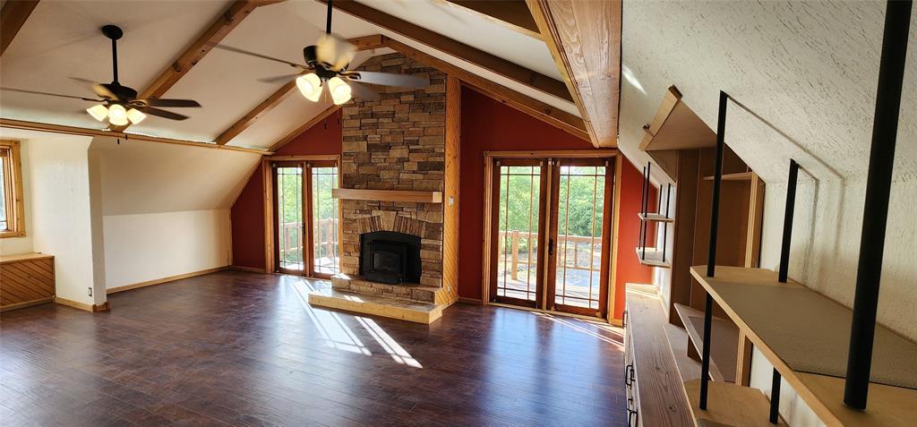 1992 County Road 330 Ranger, TX 76470 - Photo 19 of 40 a view of an entryway with a fireplace