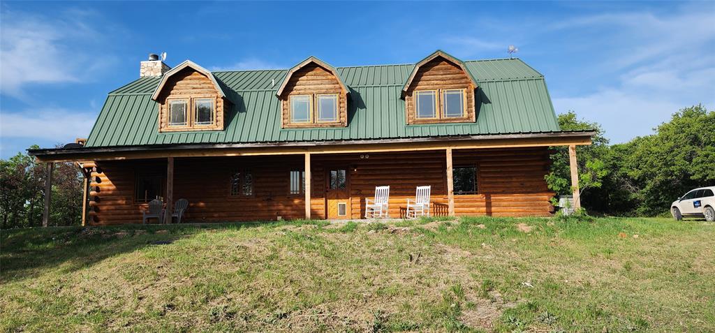 1992 County Road 330 Ranger, TX 76470 - Photo 2 of 40 front view of a house with a yard