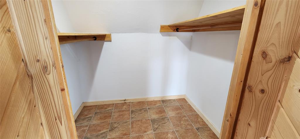 1992 County Road 330 Ranger, TX 76470 - Photo 26 of 40 a view of walk in closet