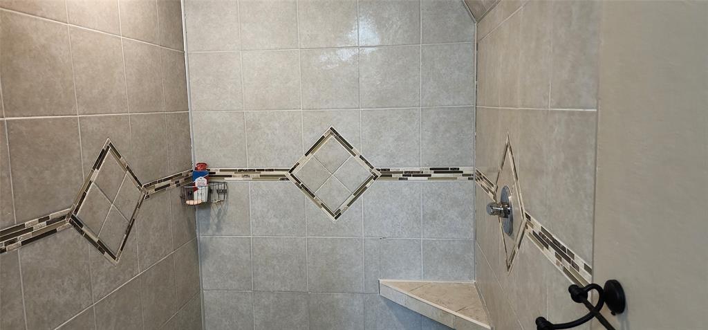 1992 County Road 330 Ranger, TX 76470 - Photo 29 of 40 a bathroom with a shower