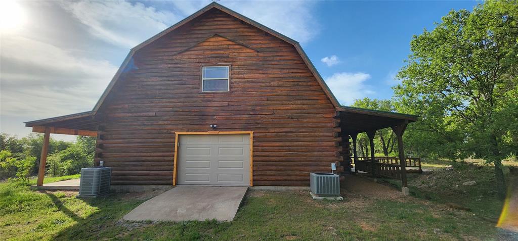 1992 County Road 330 Ranger, TX 76470 - Photo 3 of 40 a backyard of a house with barbeque oven