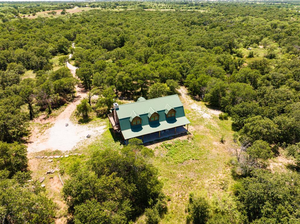 1992 County Road 330 Ranger, TX 76470 - Photo 37 of 40 a view of a yard with swimming pool