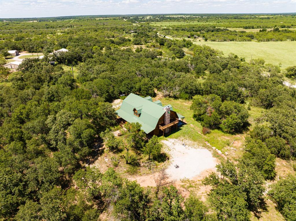 1992 County Road 330 Ranger, TX 76470 - Photo 38 of 40 a view of a yard with an outdoor space