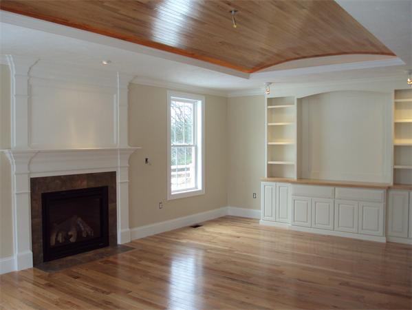 71 Kelly Road Northbridge, MA 01534 - Photo 8 of 29 a view of an empty room with wooden floor fireplace and a window