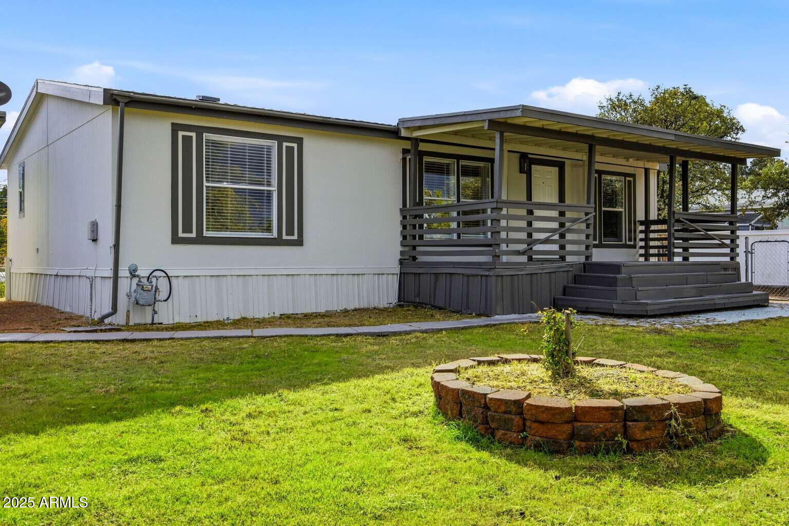 705 East Cherry Street Payson, AZ 85541 - Photo 2 of 35 a front view of house with yard