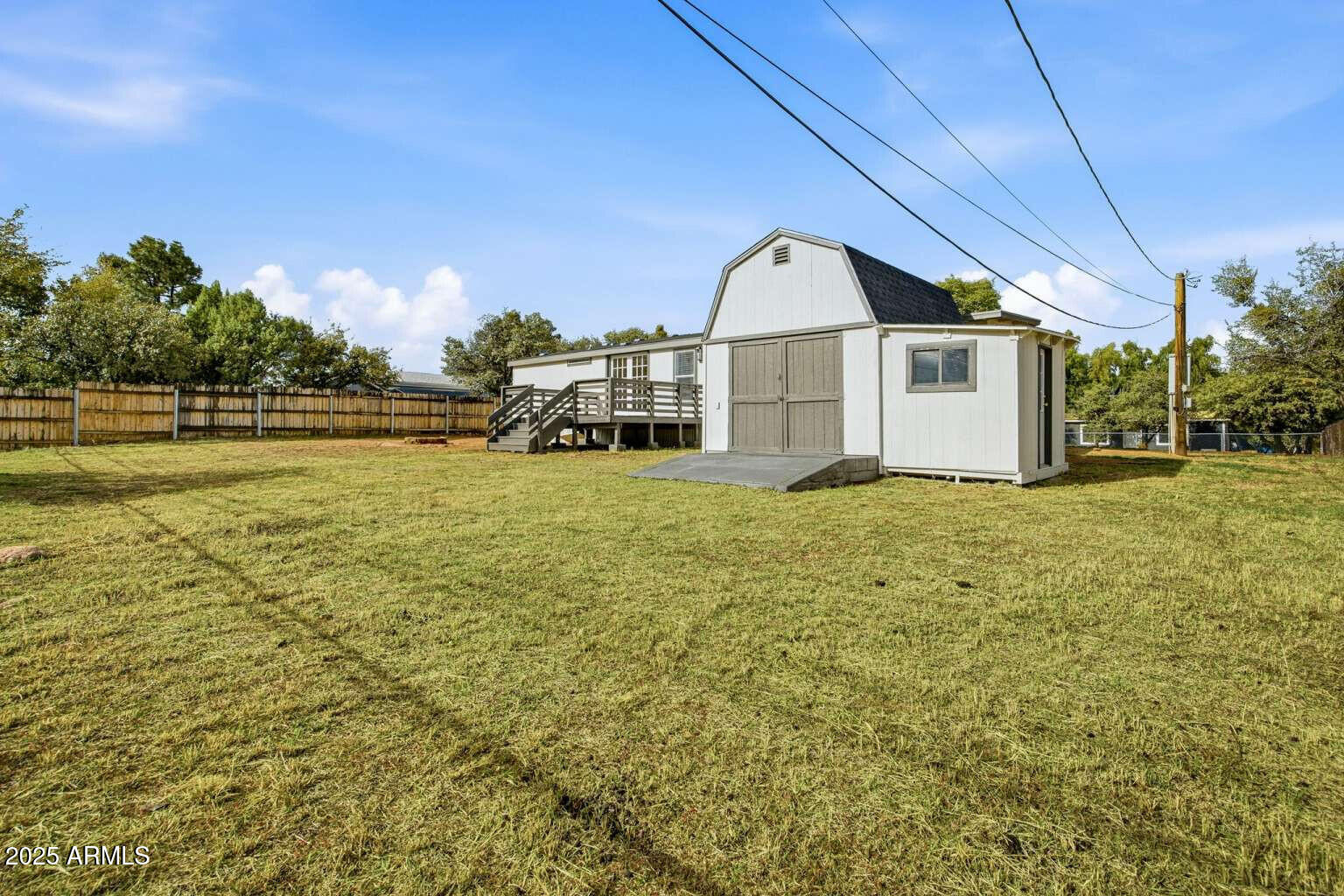 705 East Cherry Street Payson, AZ 85541 - Photo 22 of 35 a view of a house with yard and garage
