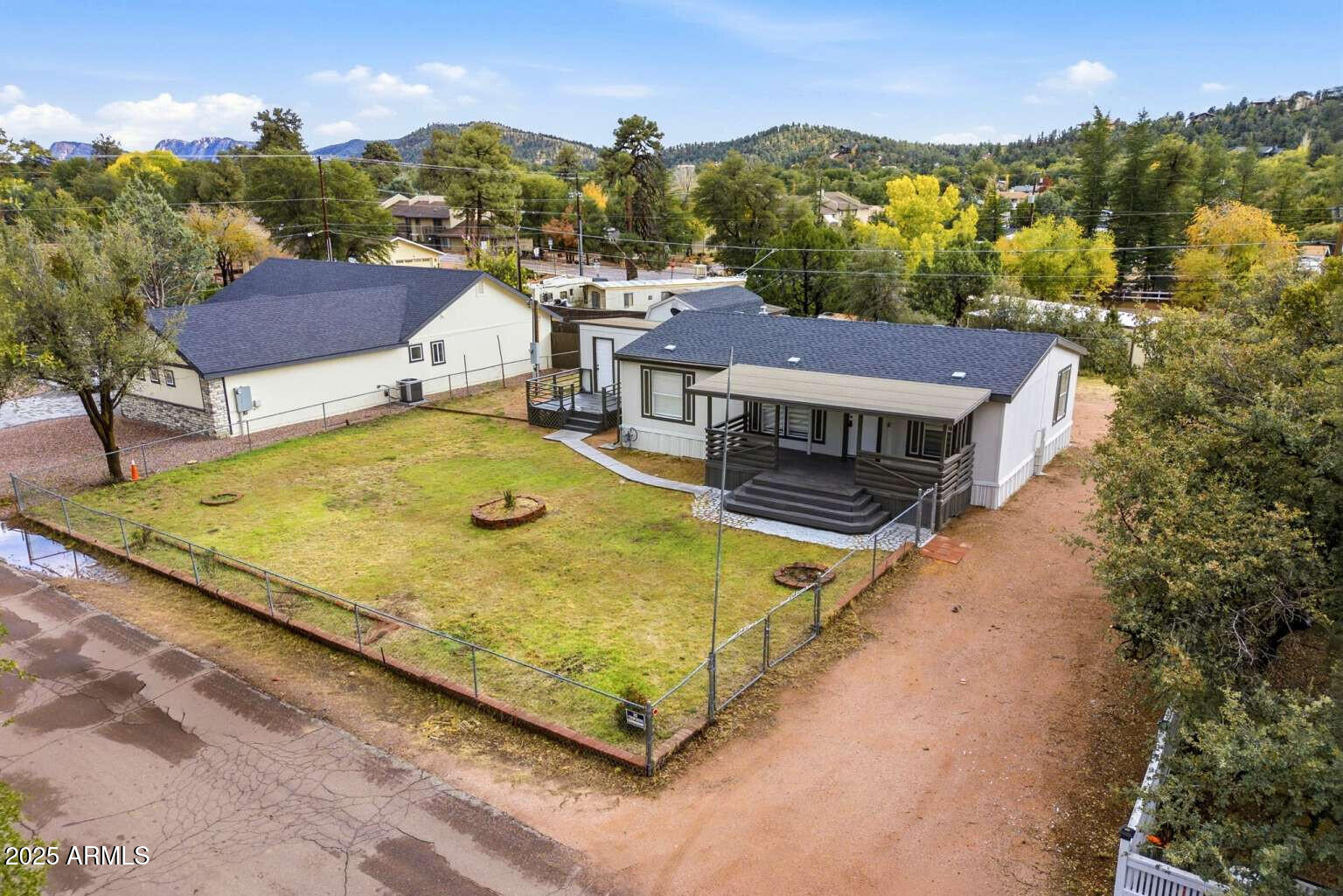 705 East Cherry Street Payson, AZ 85541 - Photo 30 of 35 a view of a swimming pool with a mountain