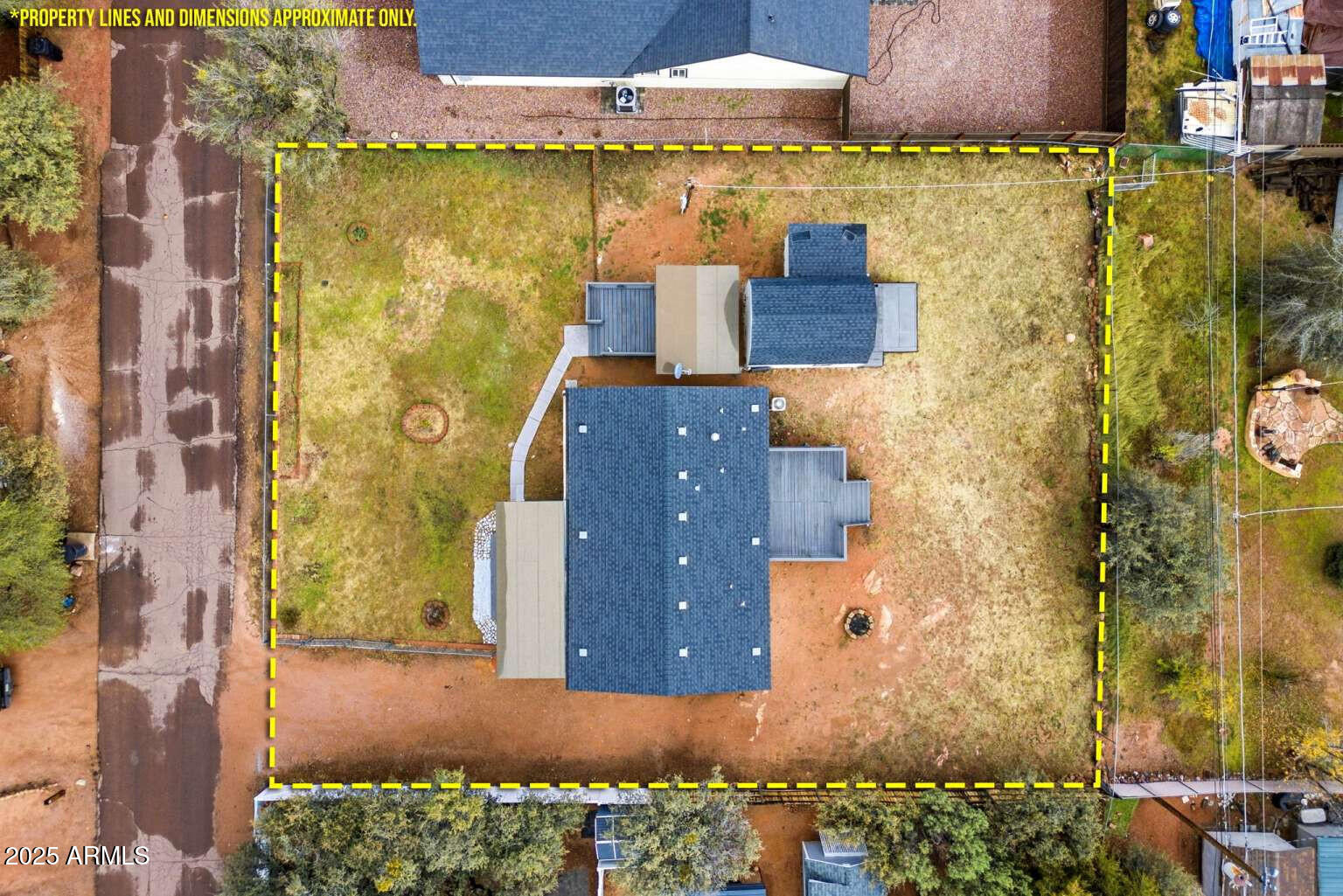 705 East Cherry Street Payson, AZ 85541 - Photo 35 of 35 an aerial view of a house with a yard