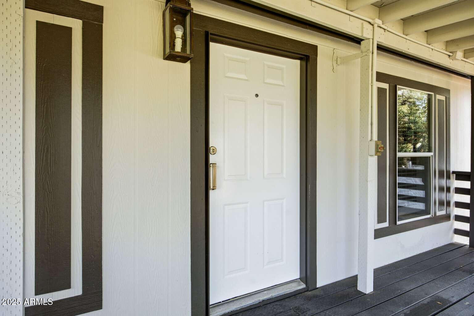 705 East Cherry Street Payson, AZ 85541 - Photo 7 of 35 a view of front door with wooden floor