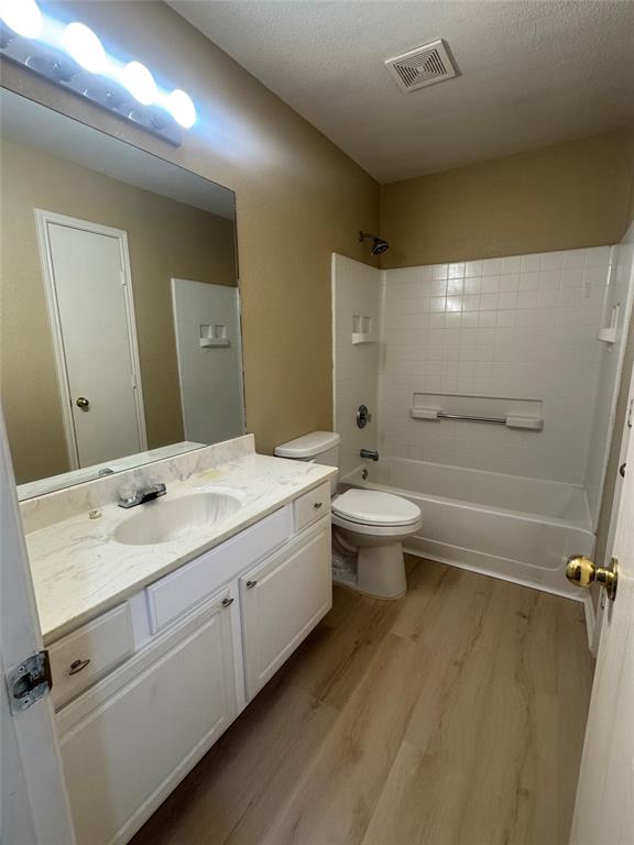 908 Cedar Ridge Lane Burleson, TX 76028 - Photo 16 of 24 a bathroom with a double vanity sink toilet mirror and shower