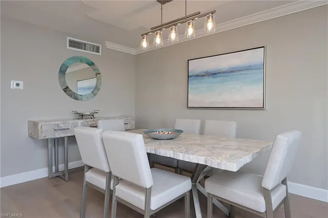 a view of a dining room with furniture