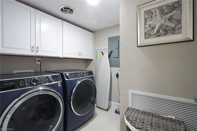 a view of hallway with washer and dryer