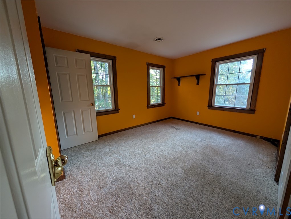 3426 Lake View Road Mechanicsville, VA 23111 - Photo 11 of 18 an empty room with windows