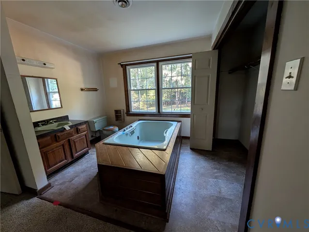 a room with furniture and a window