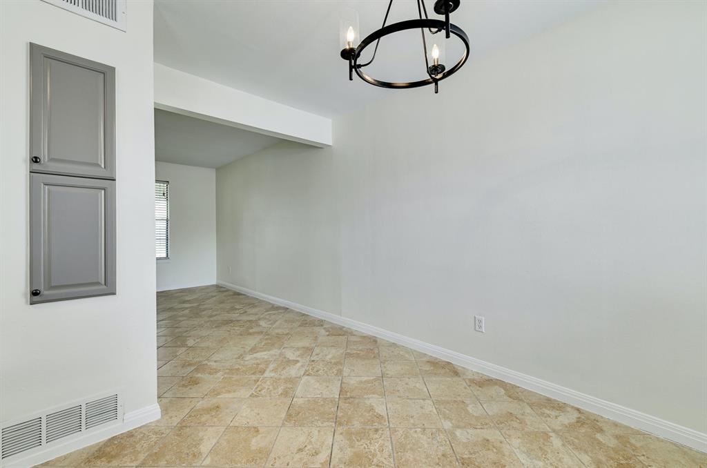 204 Northwest Drive, Unit B Round Rock, TX 78664 - Photo 14 of 25 a view of a room with racks on the wall