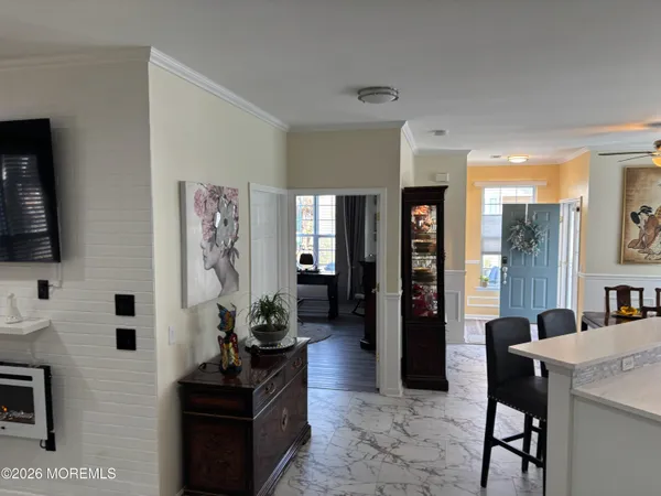 a living room with furniture and a window