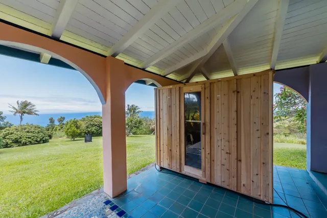 a view of balcony with wooden floor