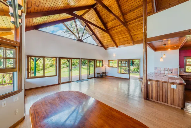 a view of livingroom with furniture and floor to ceiling window