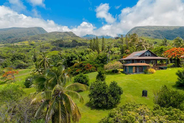 a view of a lake with a yard