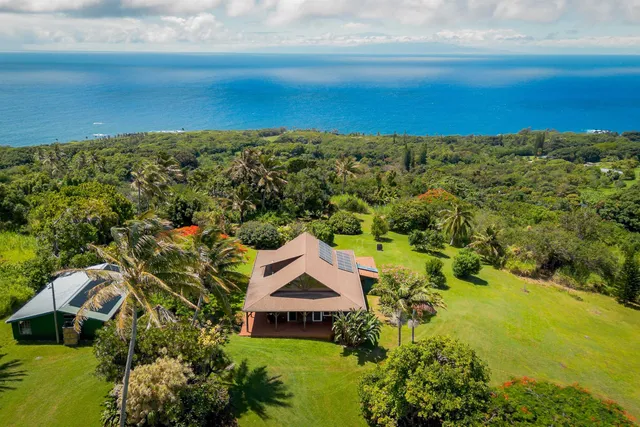 a view of a city with an ocean